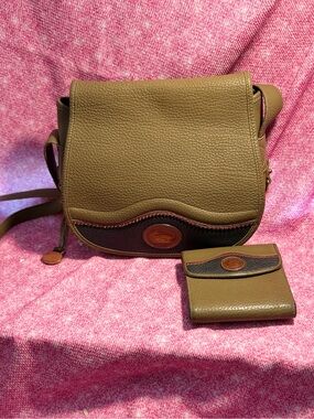 Dooney & Bourke Teton Saddle Bag &matching trifold wallet.